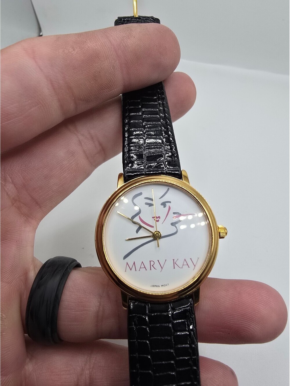 Mary Kay Women’s Quartz Analog Watch White Dial Gold Tone Steel Black Leather
